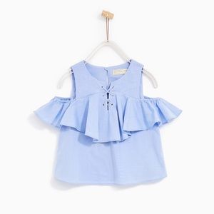 Girls top with ruffled shoulders